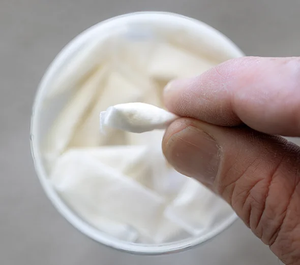 Zyn nicotine pouch on a leaf representing biodegradable eco-friendly product